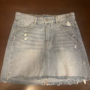H&M light wash, distressed, raw hem denim skirt size 23